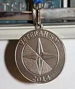 Normans sølvmedalje fra veteran-SM 2014.