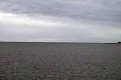 Ydre del af Bremsnesfjorden set fra færgen til Kristiansund. Grip er i horisonten omtrent midt i billedet.