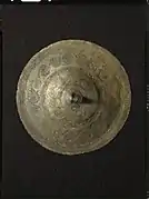 Bælteplade af bronze, forsiden.Foto: Lennart Larsen, Nationalmuseet