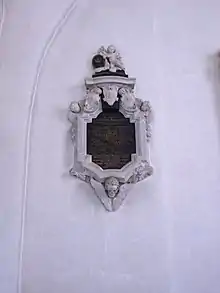 Epitafium over Ancher Anchersen, er ophængt kirkens søndre korsarm