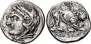 Shekel præget af antikke libyere under Lejesoldatkrigen, som forestiller Herakles og en løve, med skriften ΛIBYΩN ("libyerne"). Over løven kunne det fønikiske bogstav M muligvis stå for Mathos, som var en af oprørslederne.