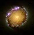 Spiralgalaksen NGC 1512 oven- eller nedenfra. NGC 1512 er 30 millioner lysår væk.