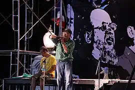 Professor Phuwadol Songprasert taler ved Government House i Bangkok, august.