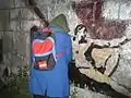 En street art version af Michelangelos berømte maleri (fra Frankrig).