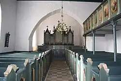 Kirkens indre set mod orglet