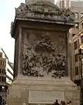Relief ved foden af Monumentet til storbranden i London